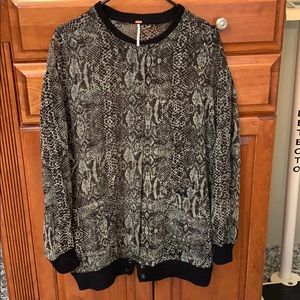 Free People leopard print in olive and black. XS